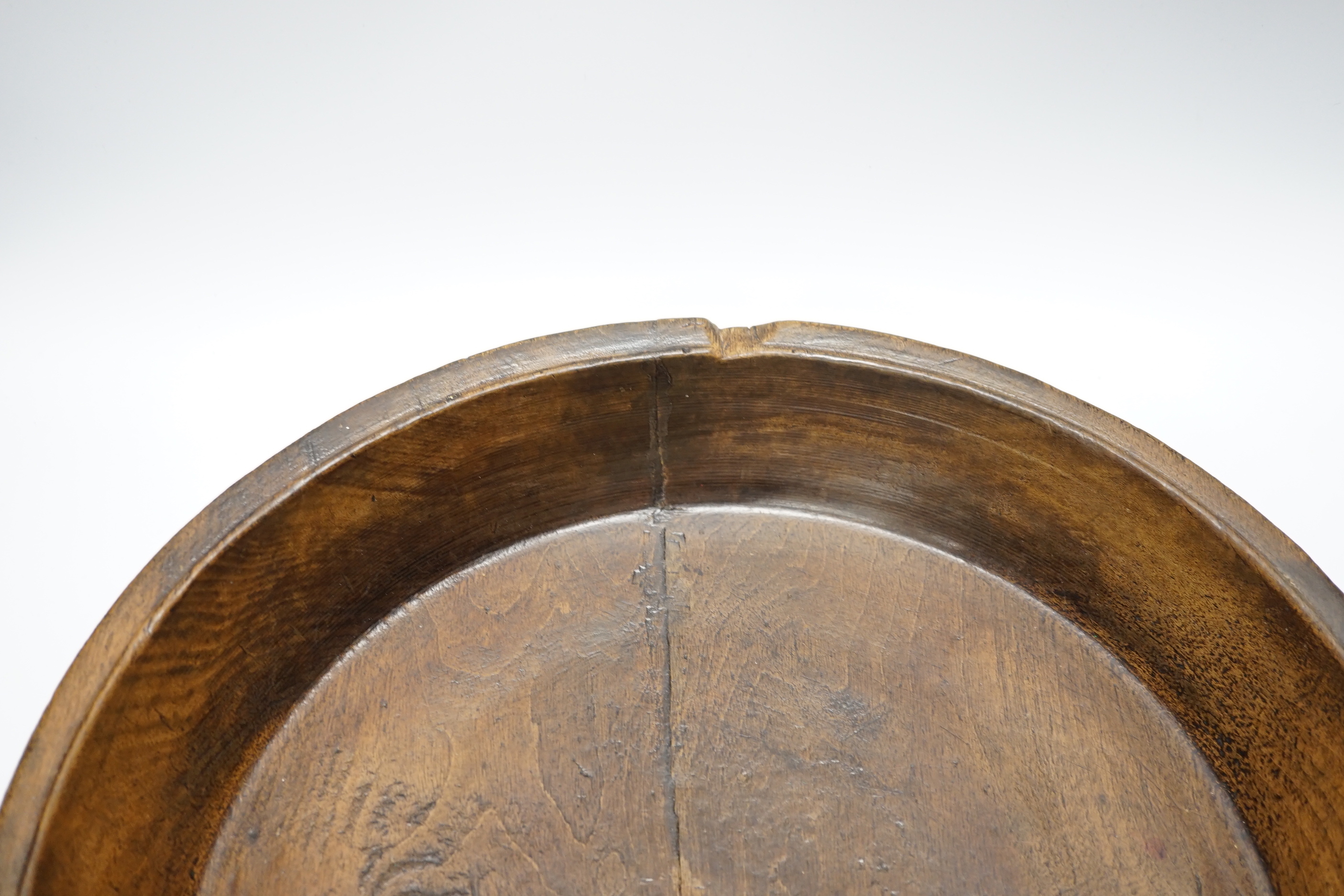 A 19th century carved circular sycamore mazer, 44cm diameter